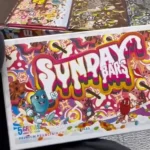 Unwrapped Sunday Fruity Pebbles Mushroom Chocolate Bar showcasing a creamy chocolate base topped with colorful cereal pieces